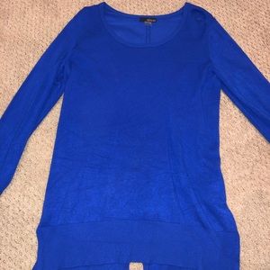 blue blouse with split back